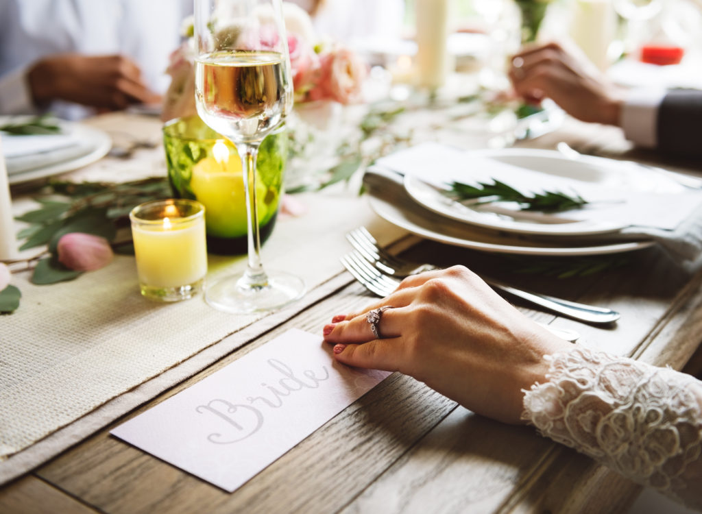 Bride showing Engagement Ring on Left Hand on Wedding Celebratio