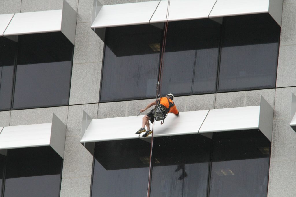 Window cleaning a skyscraper